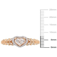 Prsten u obliku srca od ružičastog zlata od 10 karata s bijelim safirom i dijamantom koji je dizajnirala tvrtka Mac.